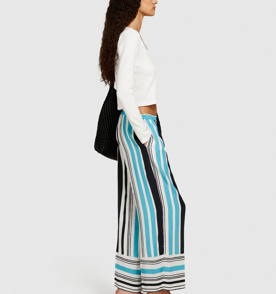 Printed satin trousers - women's flared trousers - Multi-color | Sisley image number 2